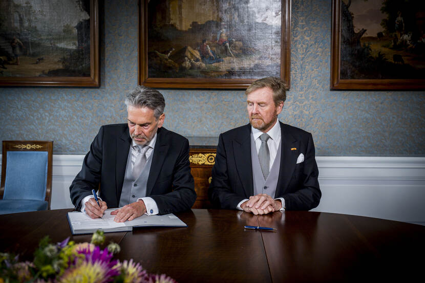 King Willem-Alexander and Prime Minister Dick Schoof sign the Royal Decrees discharging the previous government and appointing the new ministers and state secretaries.